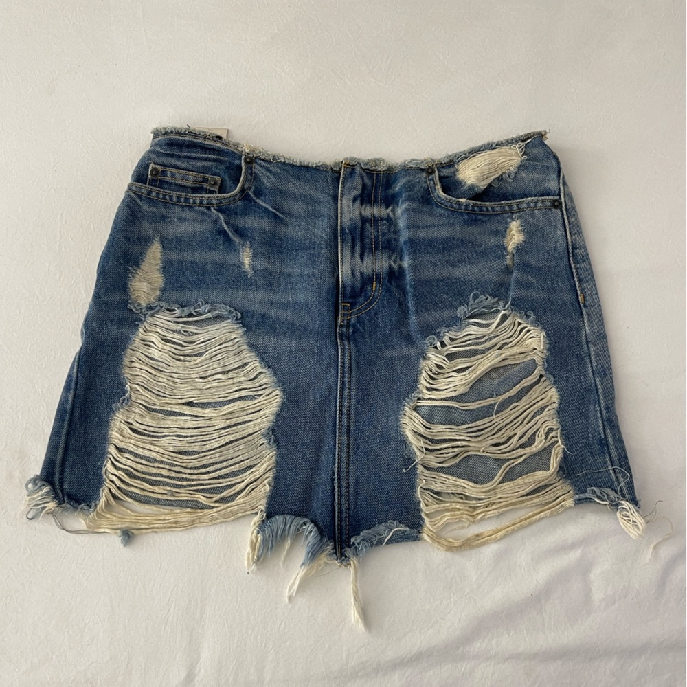 Carmar distressed mini denim skirt